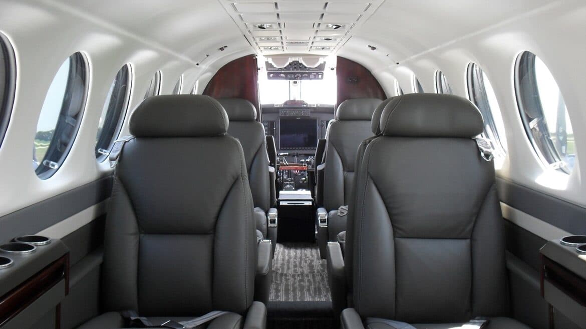 King Air 350 leather club seating interior looking forward to cockpit